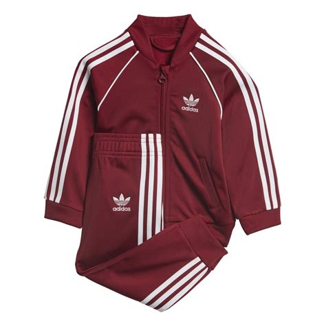 burgundy adidas originals tracksuit.